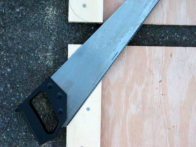 Step 6e: Using saw as try square
